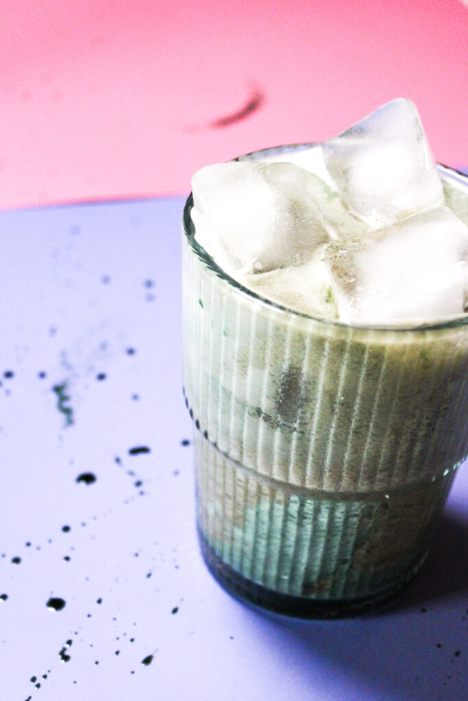 An iced pistachio vanilla chai latte.